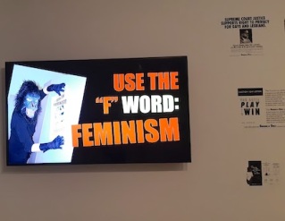 use the word feminism large